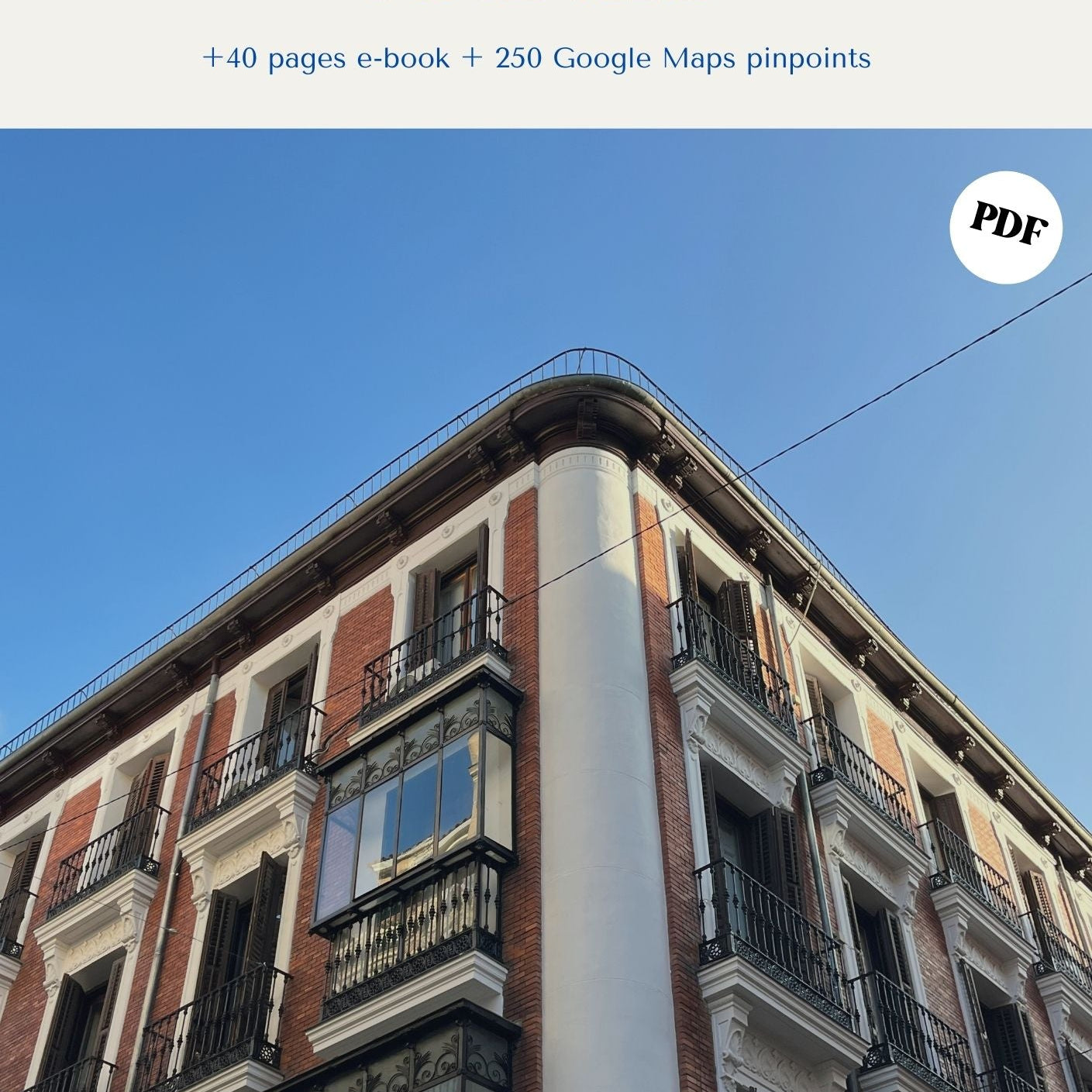 Portada de la guía de Madrid de Pipin & Mire con un edificio clásico de balcones de hierro